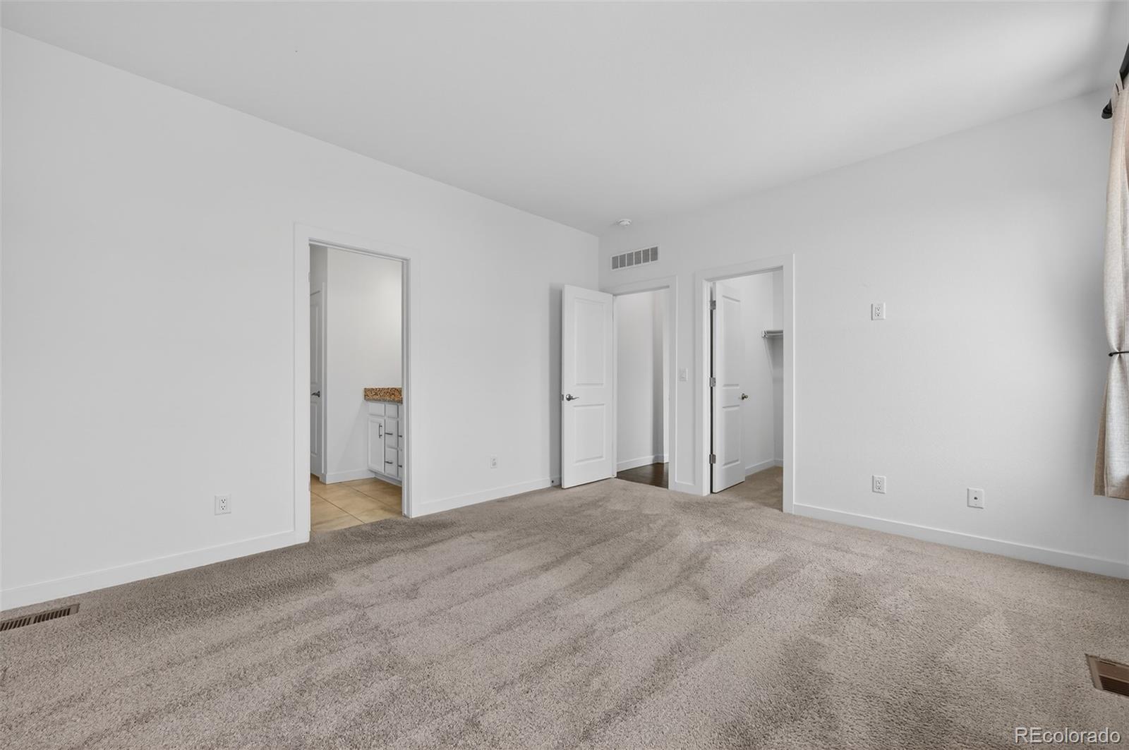 6311 Stable View Street Castle Pines, CO 80108 - Photo 14 of 46 a view of an empty room