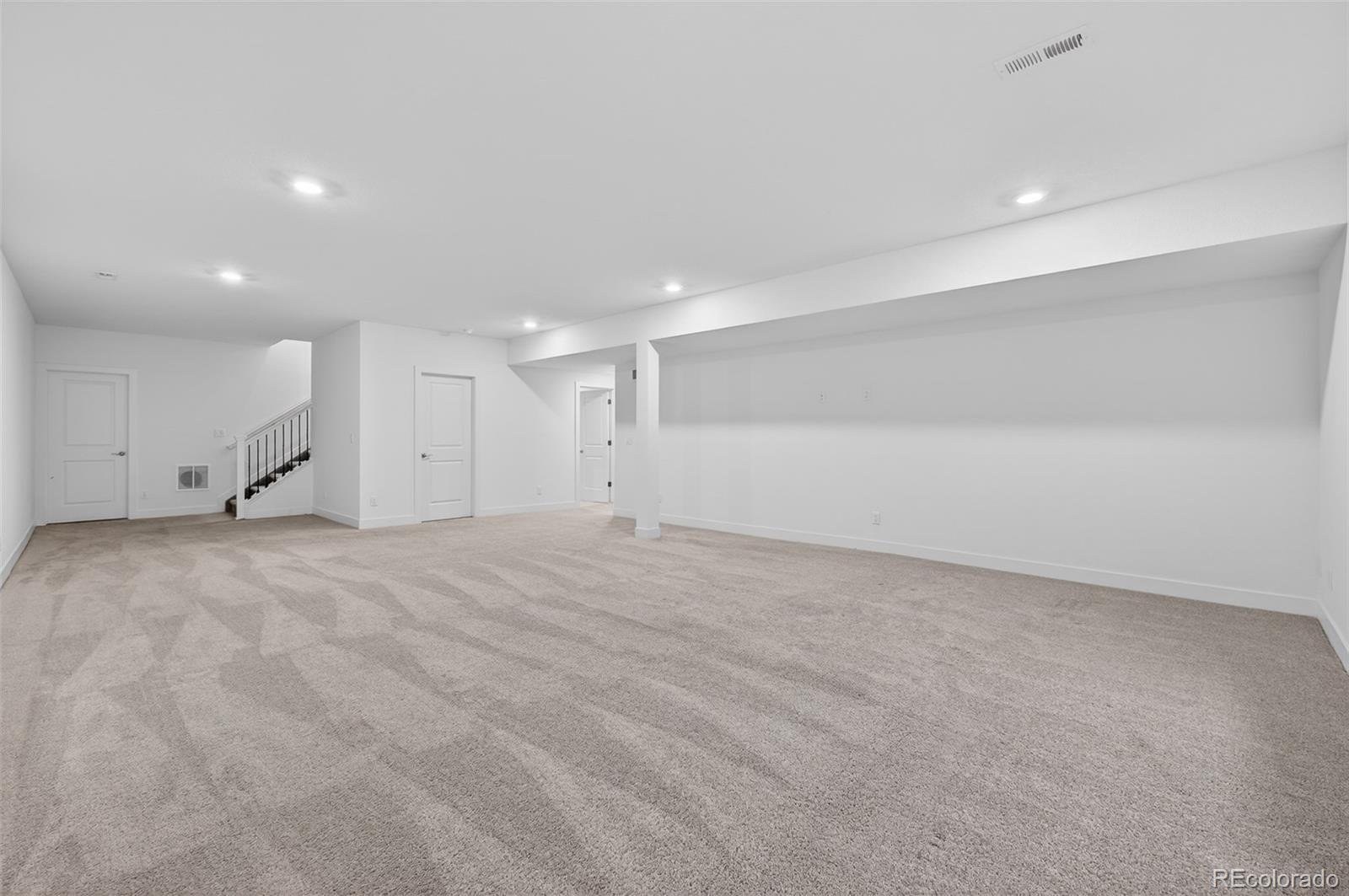 6311 Stable View Street Castle Pines, CO 80108 - Photo 29 of 46 a view of an empty room