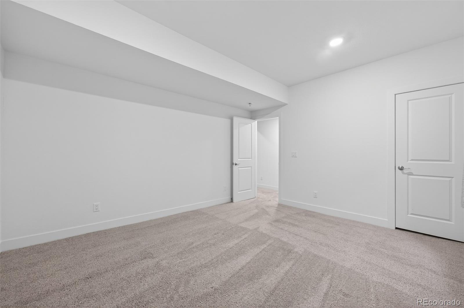 6311 Stable View Street Castle Pines, CO 80108 - Photo 32 of 46 a view of an empty room