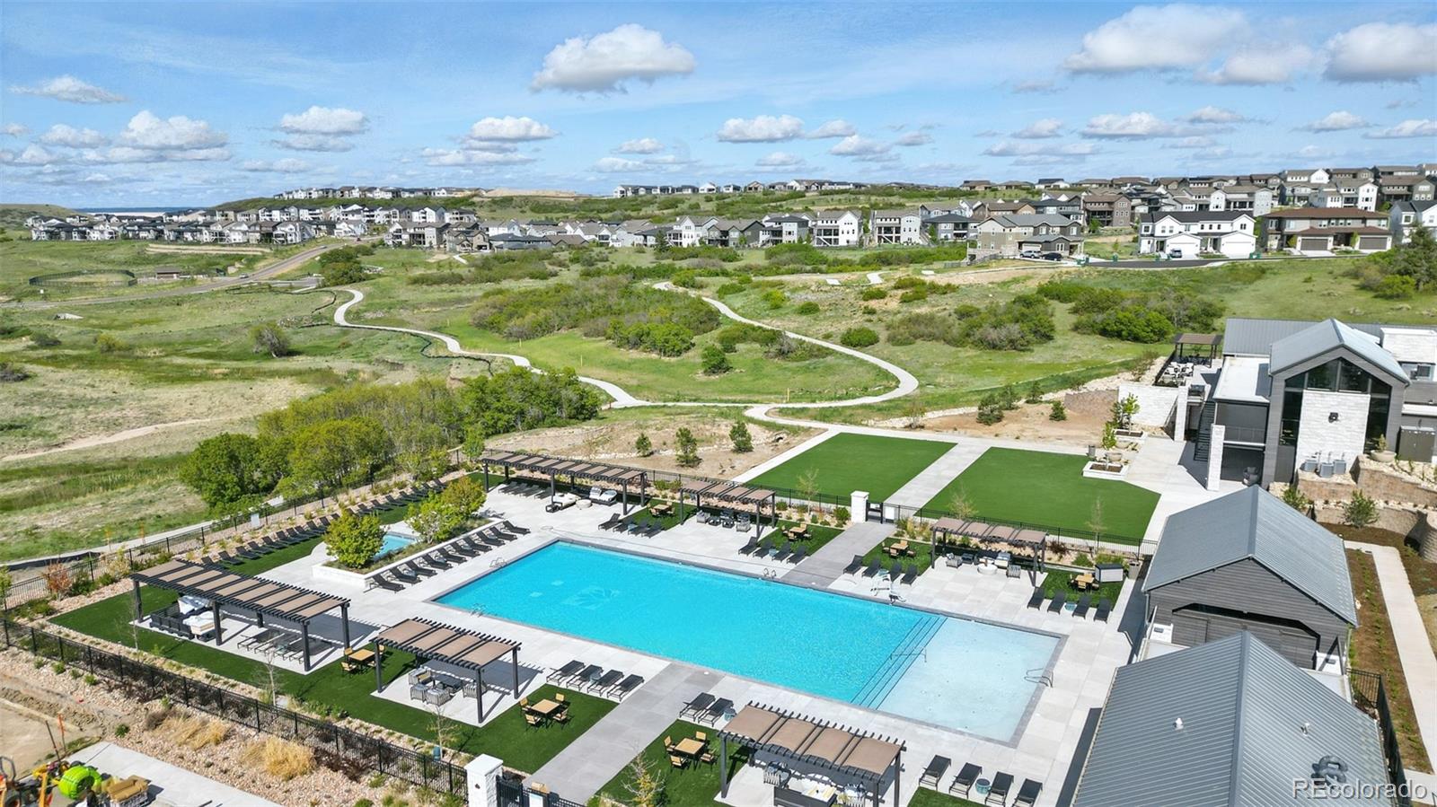 6311 Stable View Street Castle Pines, CO 80108 - Photo 44 of 46 an aerial view of a building with outdoor space