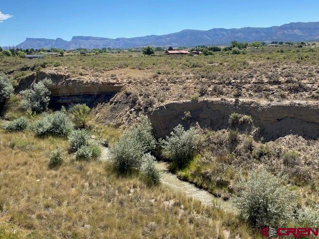 8896 Road 26.7 Loop Cortez, CO 81321 - Photo 11 of 20 a view of lake and mountain