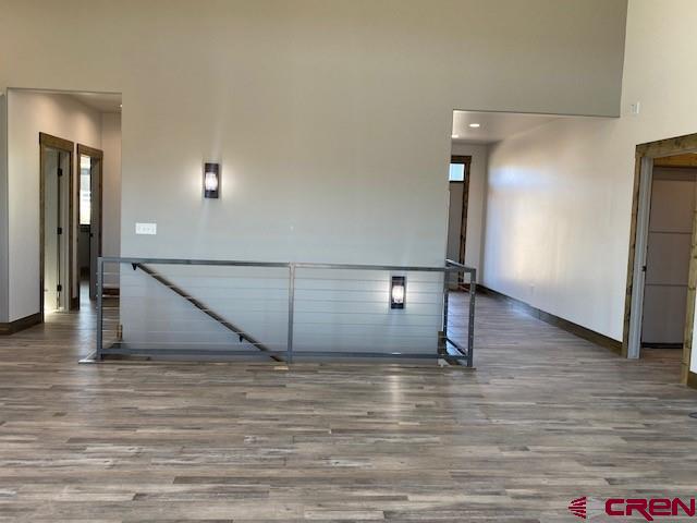 8896 Road 26.7 Loop Cortez, CO 81321 - Photo 16 of 20 a view of a livingroom with wooden floor