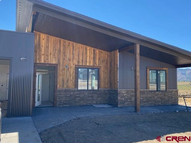 8896 Road 26.7 Loop Cortez, CO 81321 - Photo 2 of 20 an empty room with windows