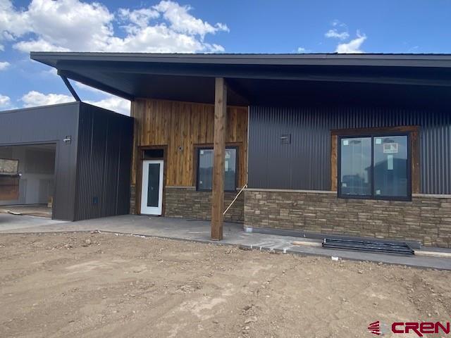 8896 Road 26.7 Loop Cortez, CO 81321 - Photo 3 of 20 a view of entrance door of the house