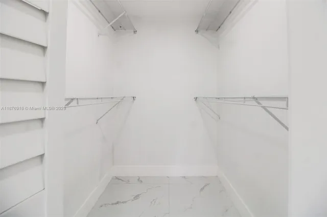 a view of a room with racks on the wall