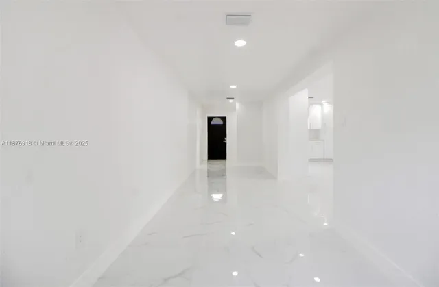 a view of a big room with an empty space