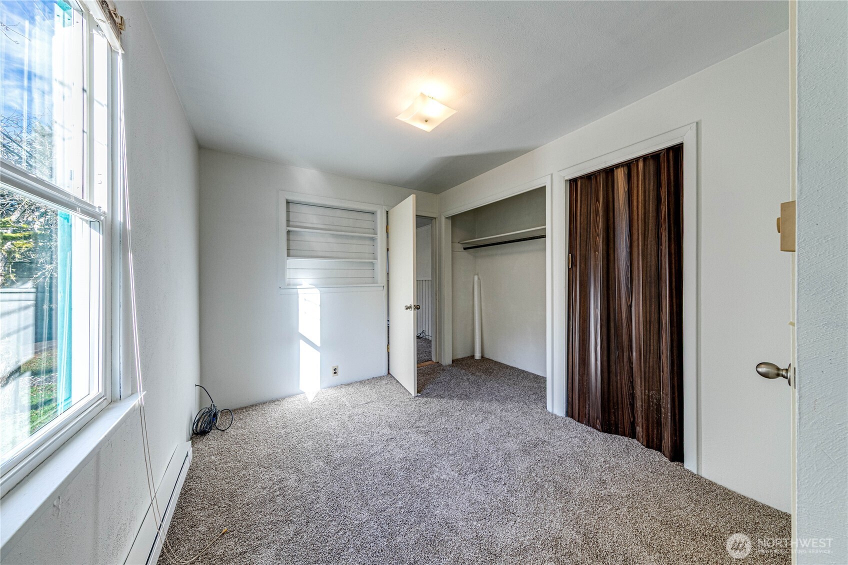 1520 Scrivner Road Port Angeles, WA 98362 - Photo 16 of 40 an empty room with windows and closet