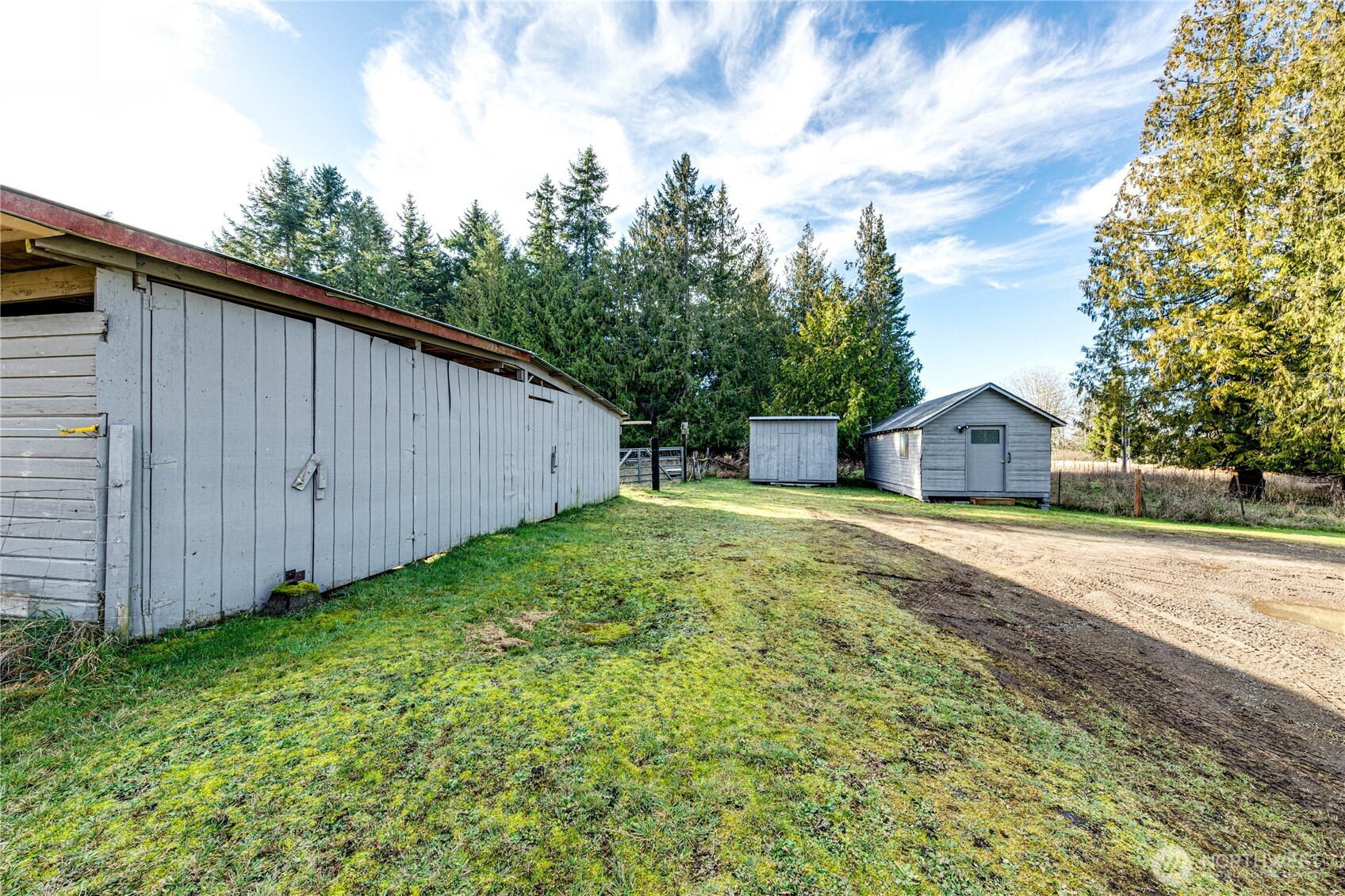 1520 Scrivner Road Port Angeles, WA 98362 - Photo 27 of 40 a backyard of a house with wooden fence
