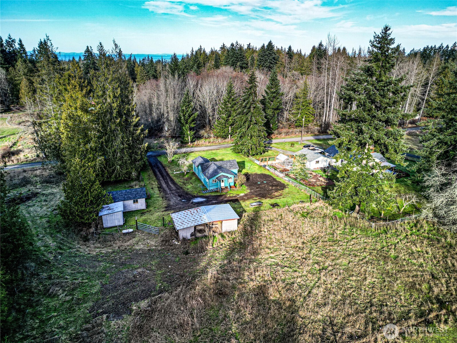 1520 Scrivner Road Port Angeles, WA 98362 - Photo 33 of 40 a view of a bench in a garden