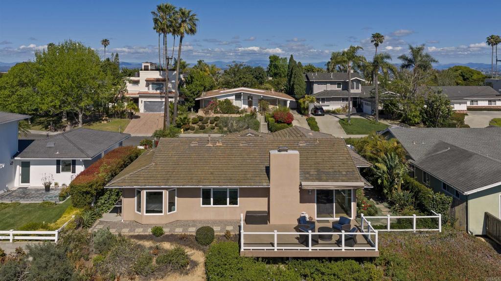 5958 Sagebrush Road La Jolla, CA 92037 - Photo 13 of 64 an aerial view of a house with a garden and plants