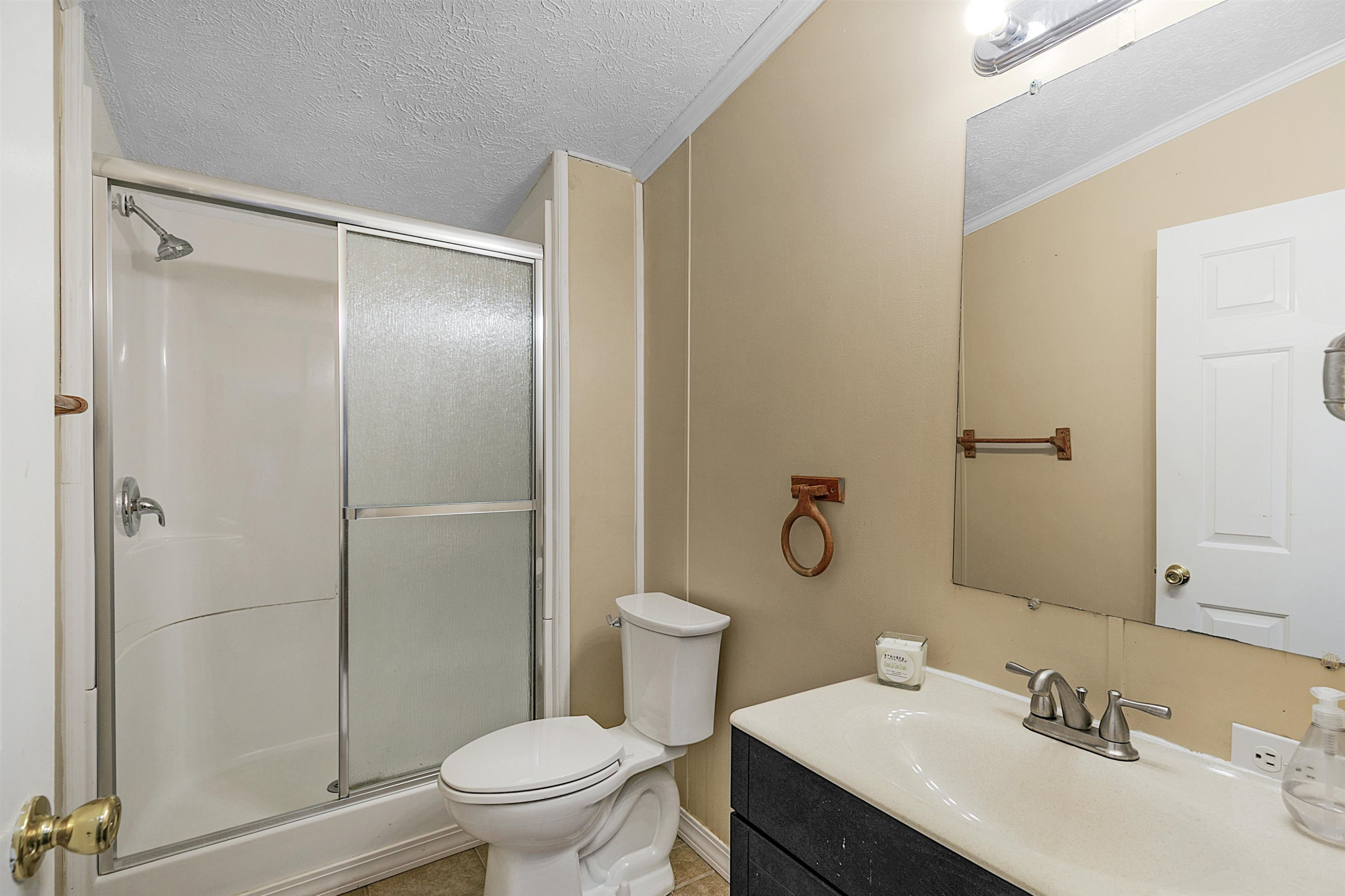 4022 Lower Jackson Road Bells, TN 38006 - Photo 14 of 18 a bathroom with a sink toilet and shower