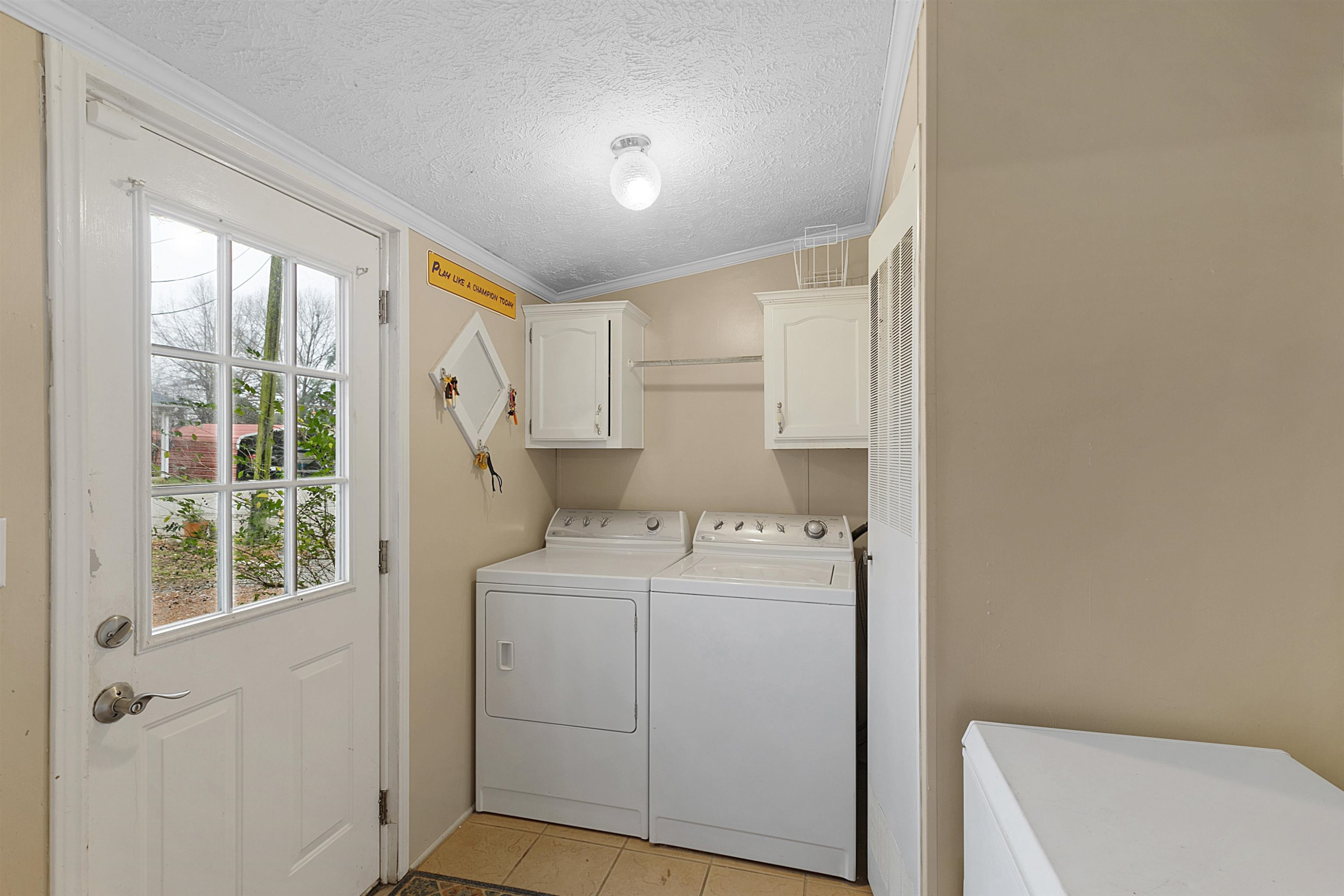 4022 Lower Jackson Road Bells, TN 38006 - Photo 16 of 18 a utility room with dryer and washer