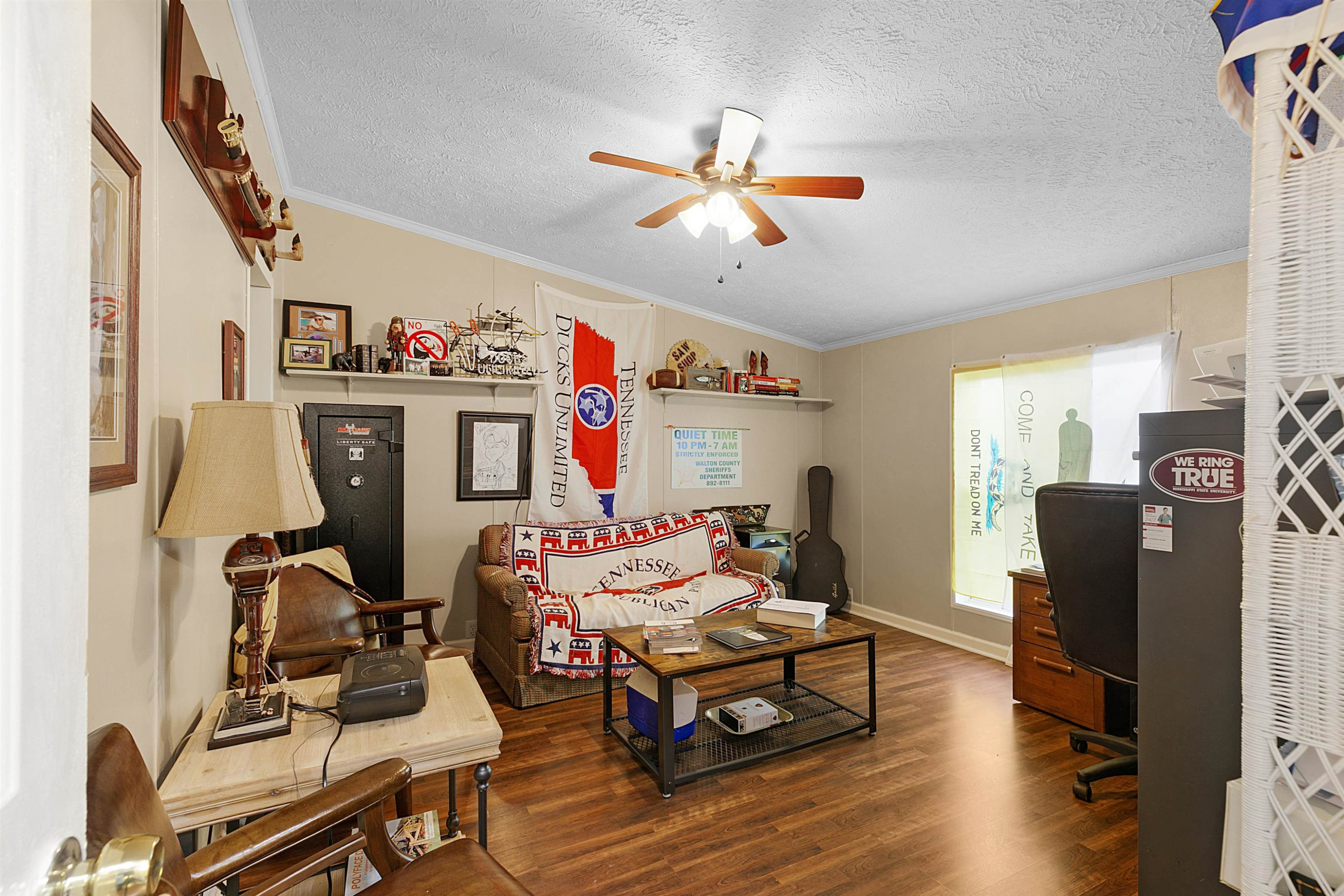 4022 Lower Jackson Road Bells, TN 38006 - Photo 18 of 18 a living room with furniture and a flat screen tv