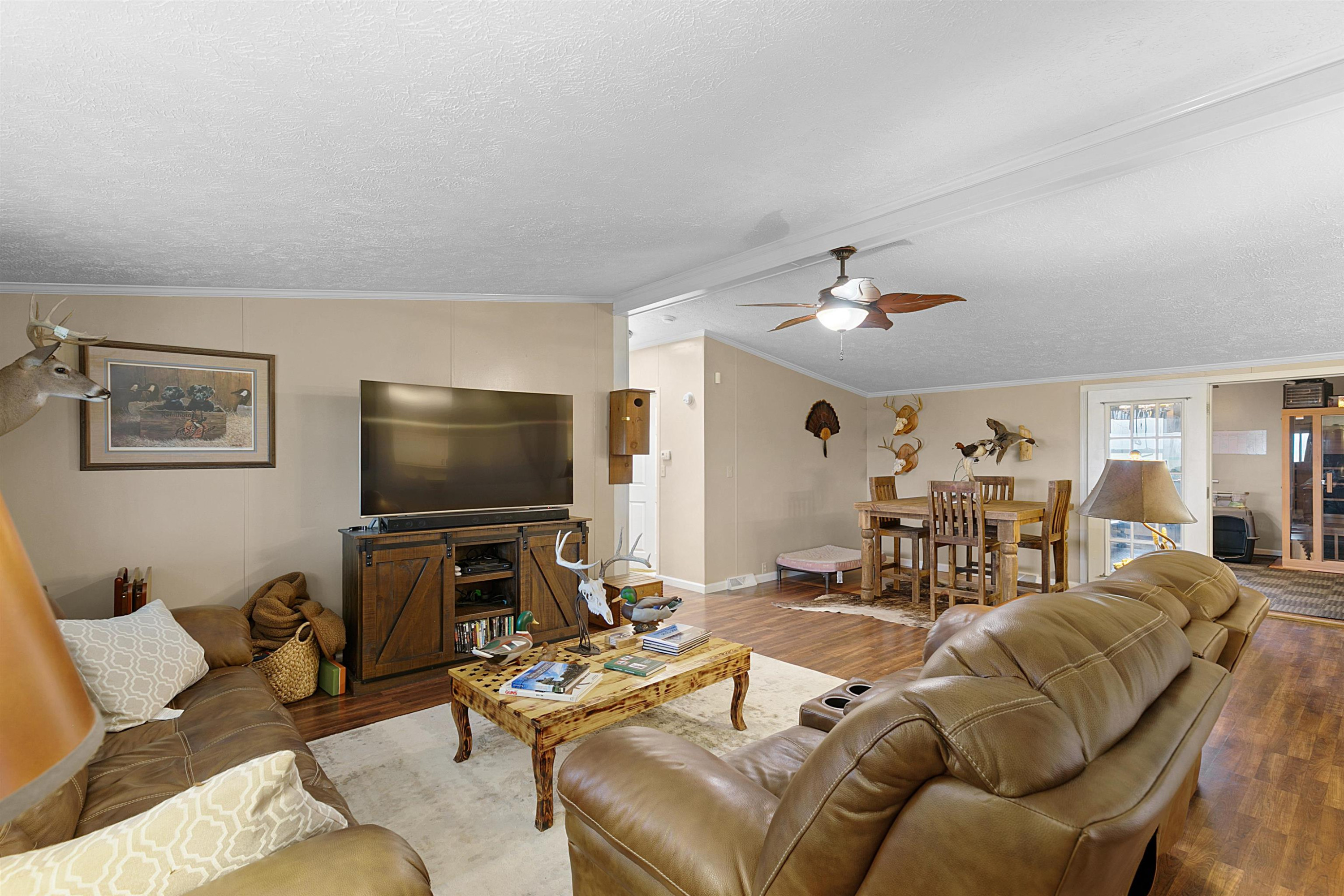 4022 Lower Jackson Road Bells, TN 38006 - Photo 5 of 18 a living room with furniture and a flat screen tv