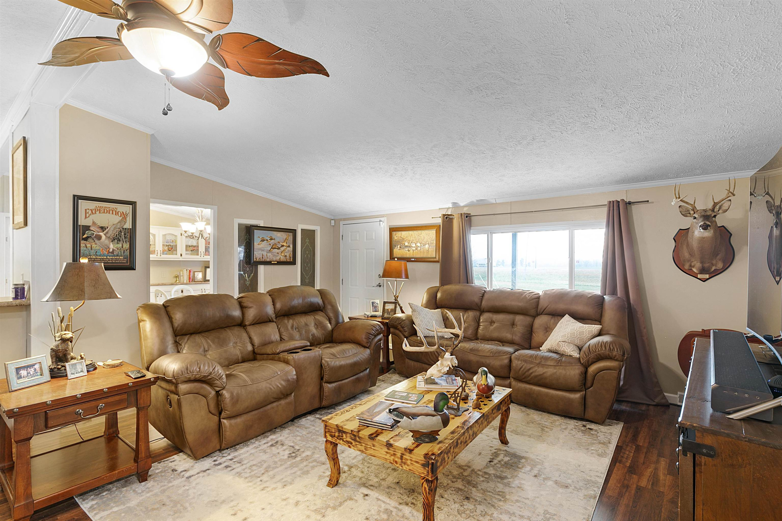 4022 Lower Jackson Road Bells, TN 38006 - Photo 6 of 18 a living room with furniture and a large window