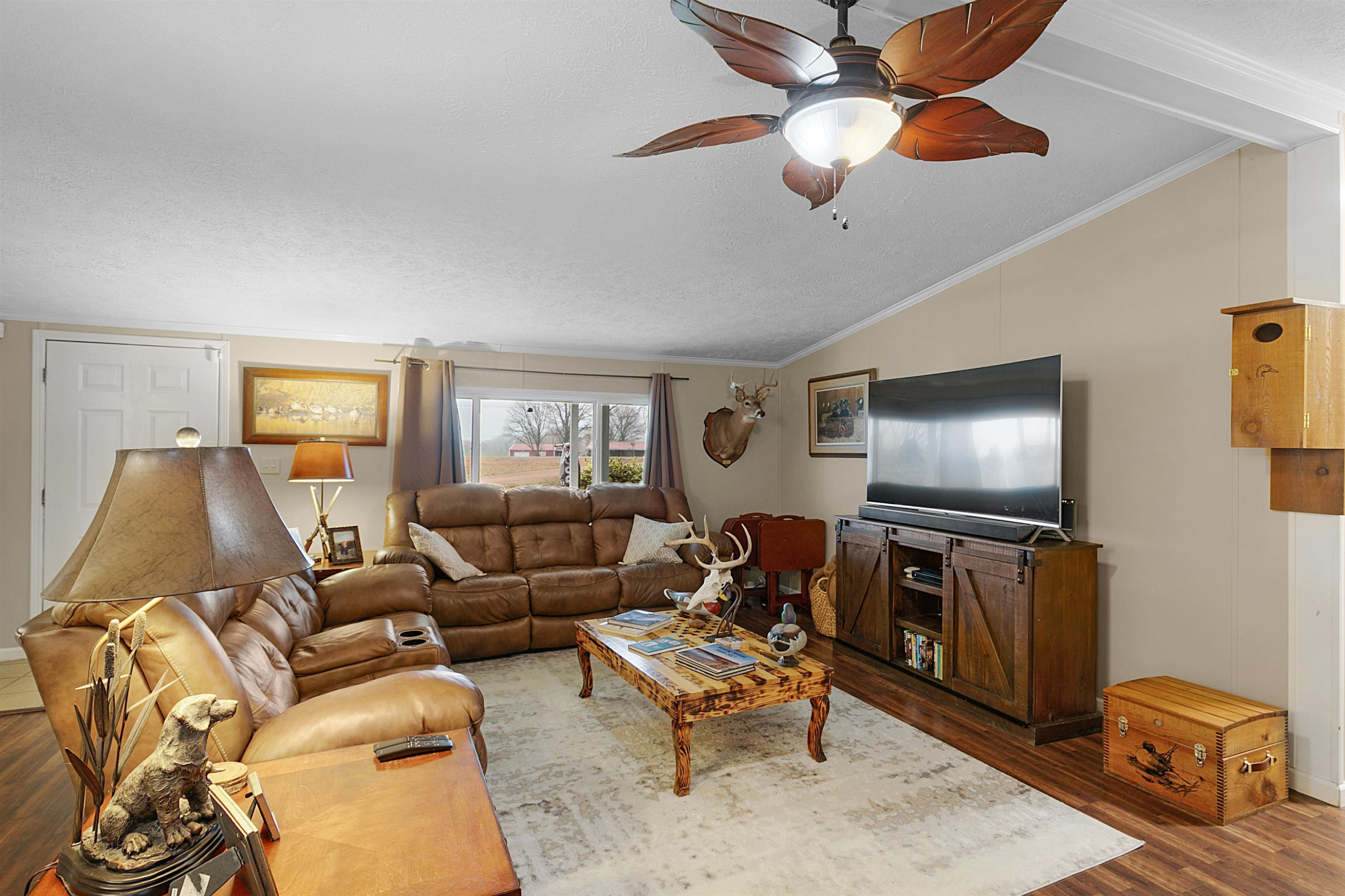 4022 Lower Jackson Road Bells, TN 38006 - Photo 7 of 18 a living room with furniture and a flat screen tv