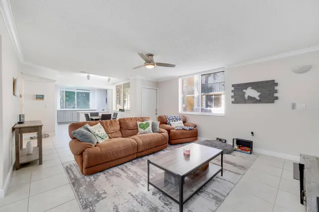 a living room with furniture and a table