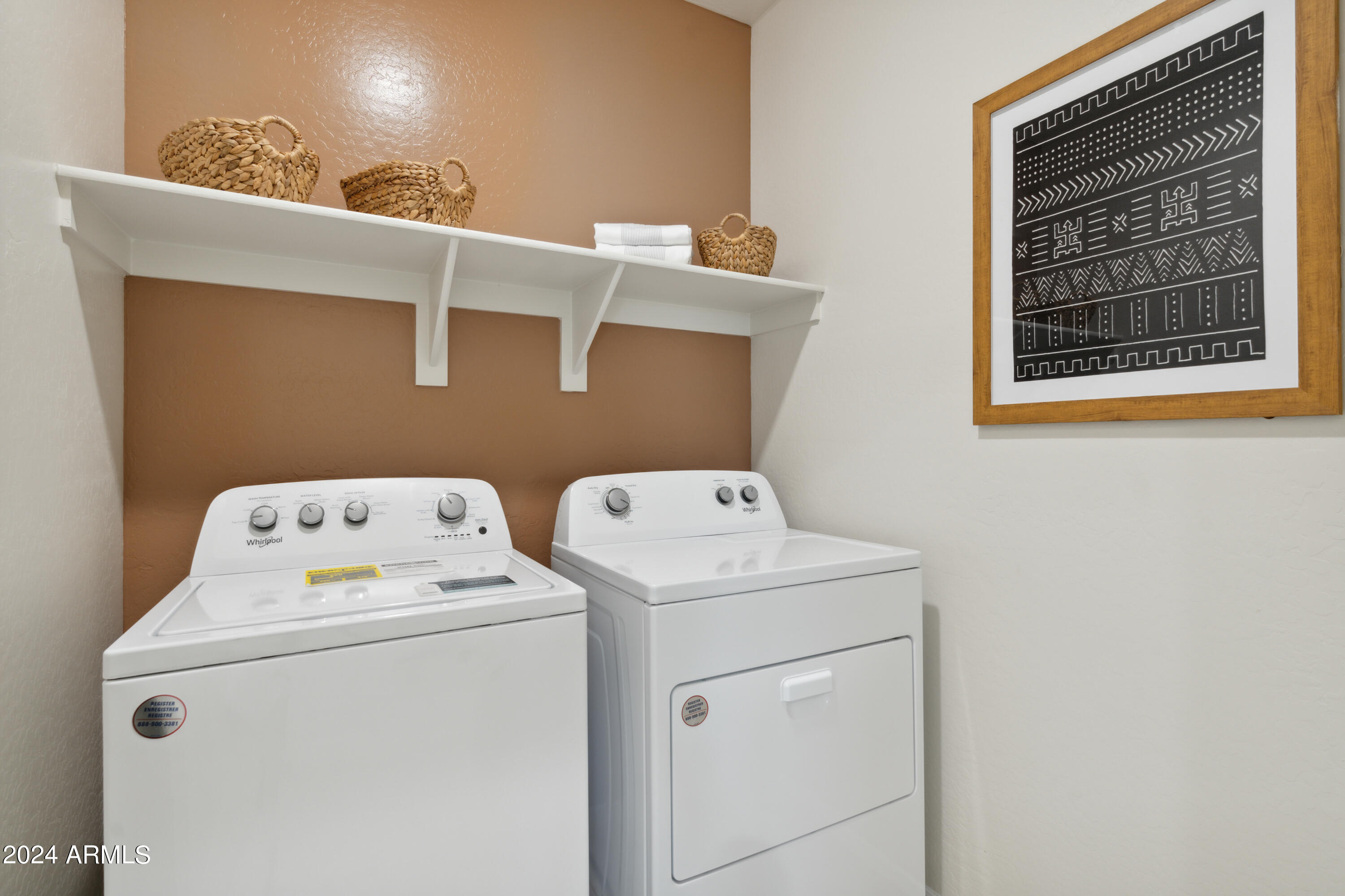 8522 West Gehrig Way Florence, AZ 85132 - Photo 18 of 46 a utility room with dryer and washer