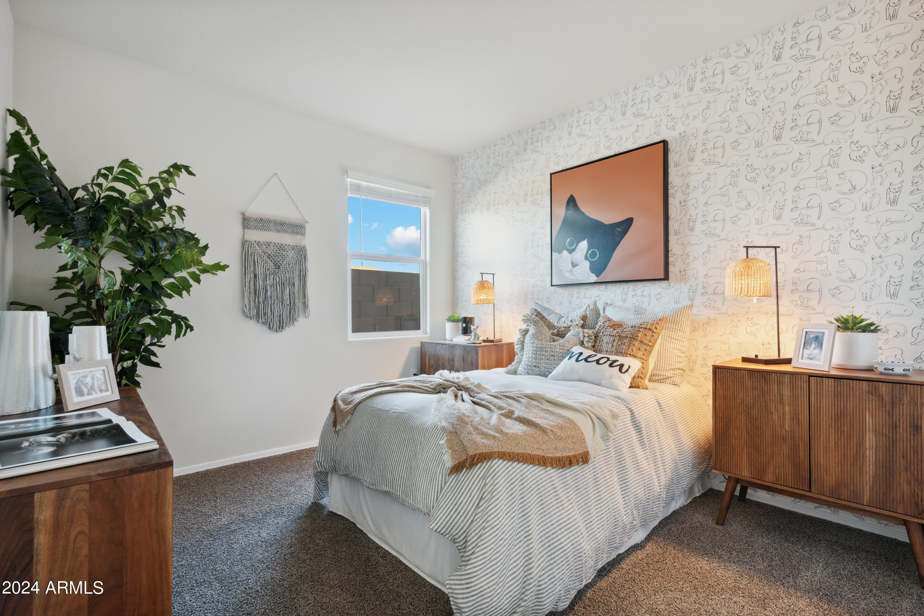 8522 West Gehrig Way Florence, AZ 85132 - Photo 8 of 46 a bedroom with bed and a potted plant