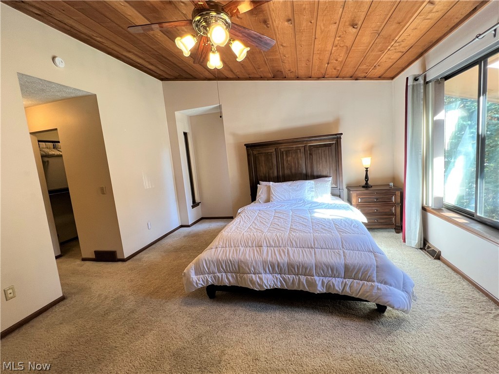 35655 Timber Ridge Lane Willoughby, OH 44094 - Photo 13 of 32 Gorgeous light filled bedroom with a beautiful door, sawed cedar wood ceiling and picture window.