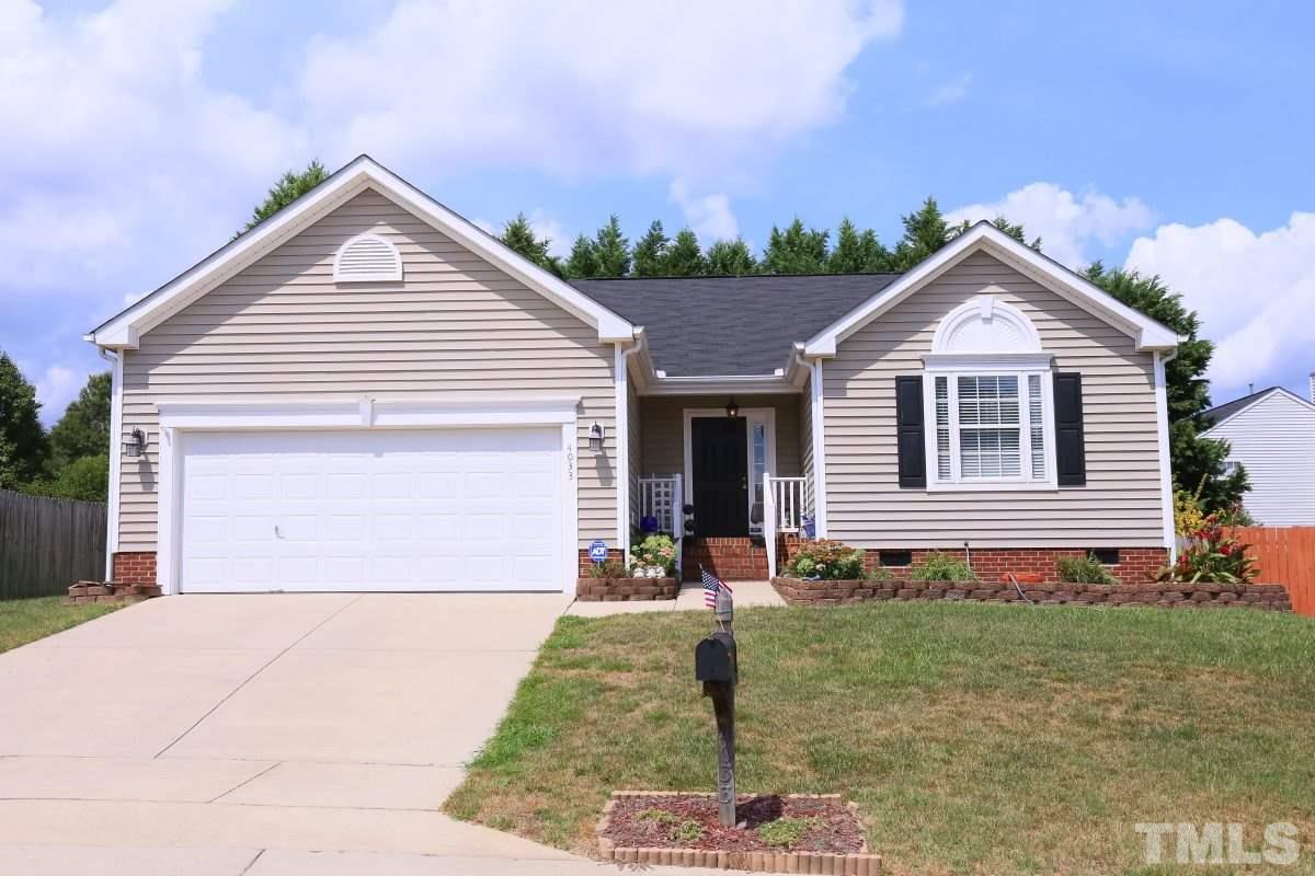 4033 Mantua Way Raleigh, NC 27604 - Photo 1 of 23 a front view of a house with garden