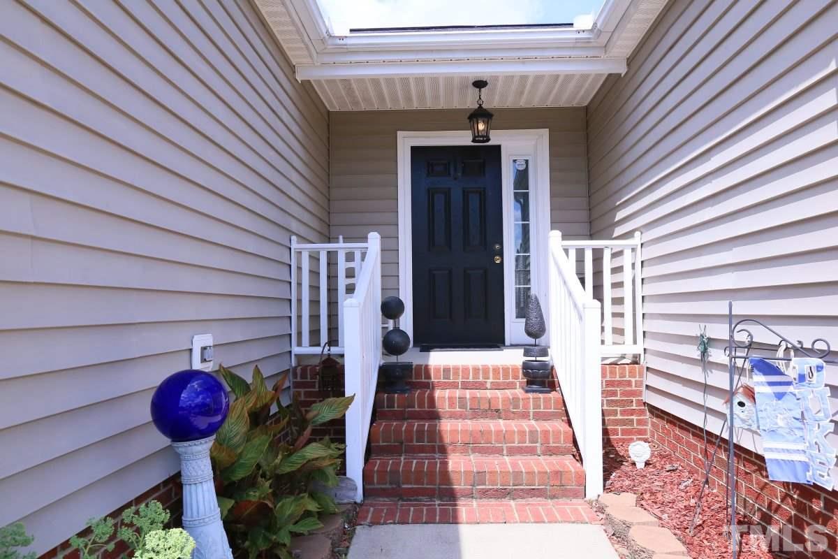 4033 Mantua Way Raleigh, NC 27604 - Photo 2 of 23 a view of a entryway door front of house