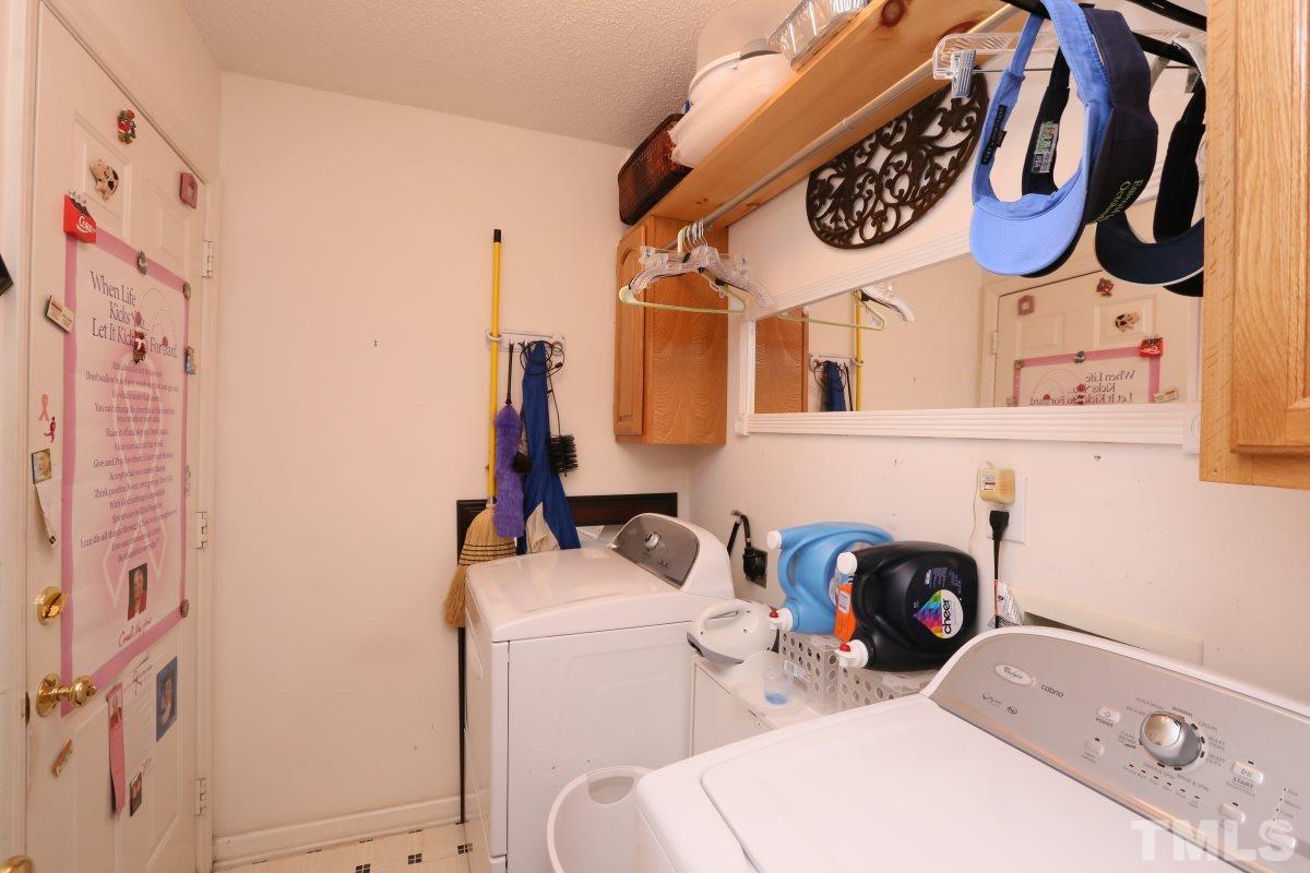 4033 Mantua Way Raleigh, NC 27604 - Photo 20 of 23 a utility room with dryer and washer