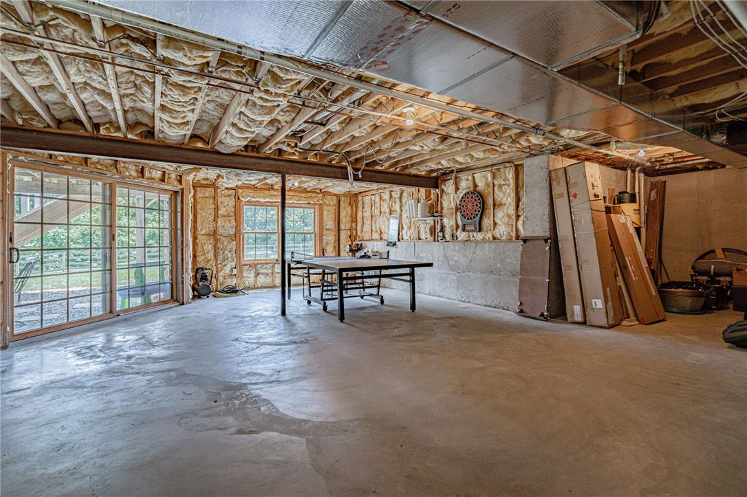 6000 Pond View Terrace Bath, PA 18014 - Photo 49 of 69 Unfinished basement with exterior access and abundant natural light.