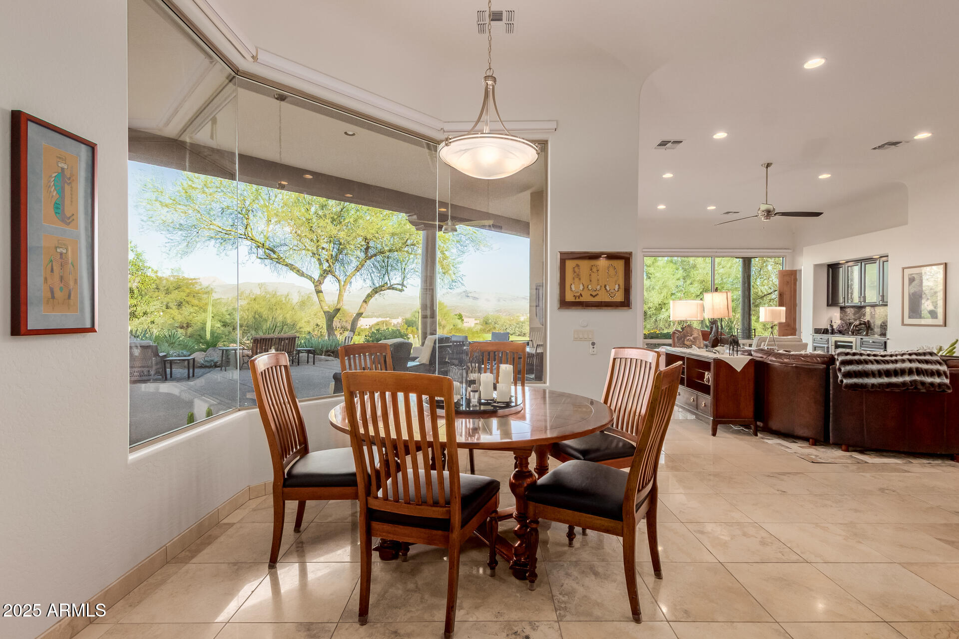 27609 Desierto Drive Rio Verde, AZ 85263 - Photo 16 of 86 a view of a dining room with furniture window and outside view