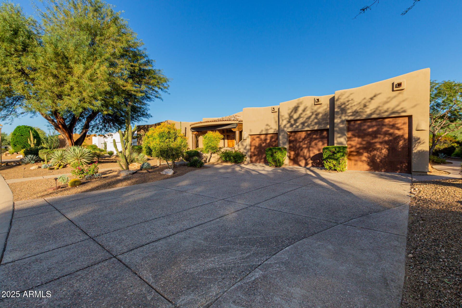 27609 Desierto Drive Rio Verde, AZ 85263 - Photo 2 of 86 a view of a street with a building in the background