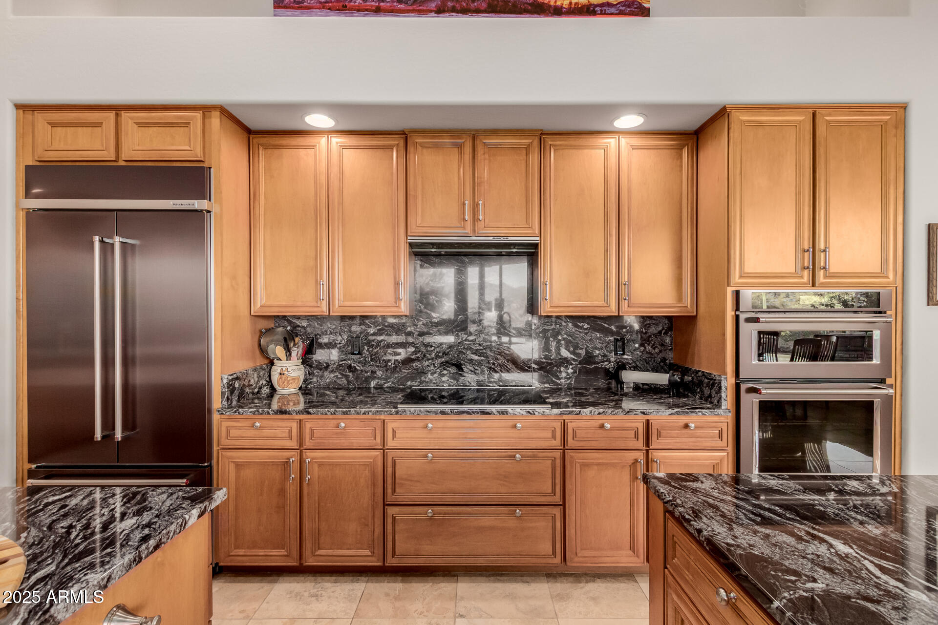 27609 Desierto Drive Rio Verde, AZ 85263 - Photo 23 of 86 a kitchen with stainless steel appliances granite countertop a stove and a refrigerator