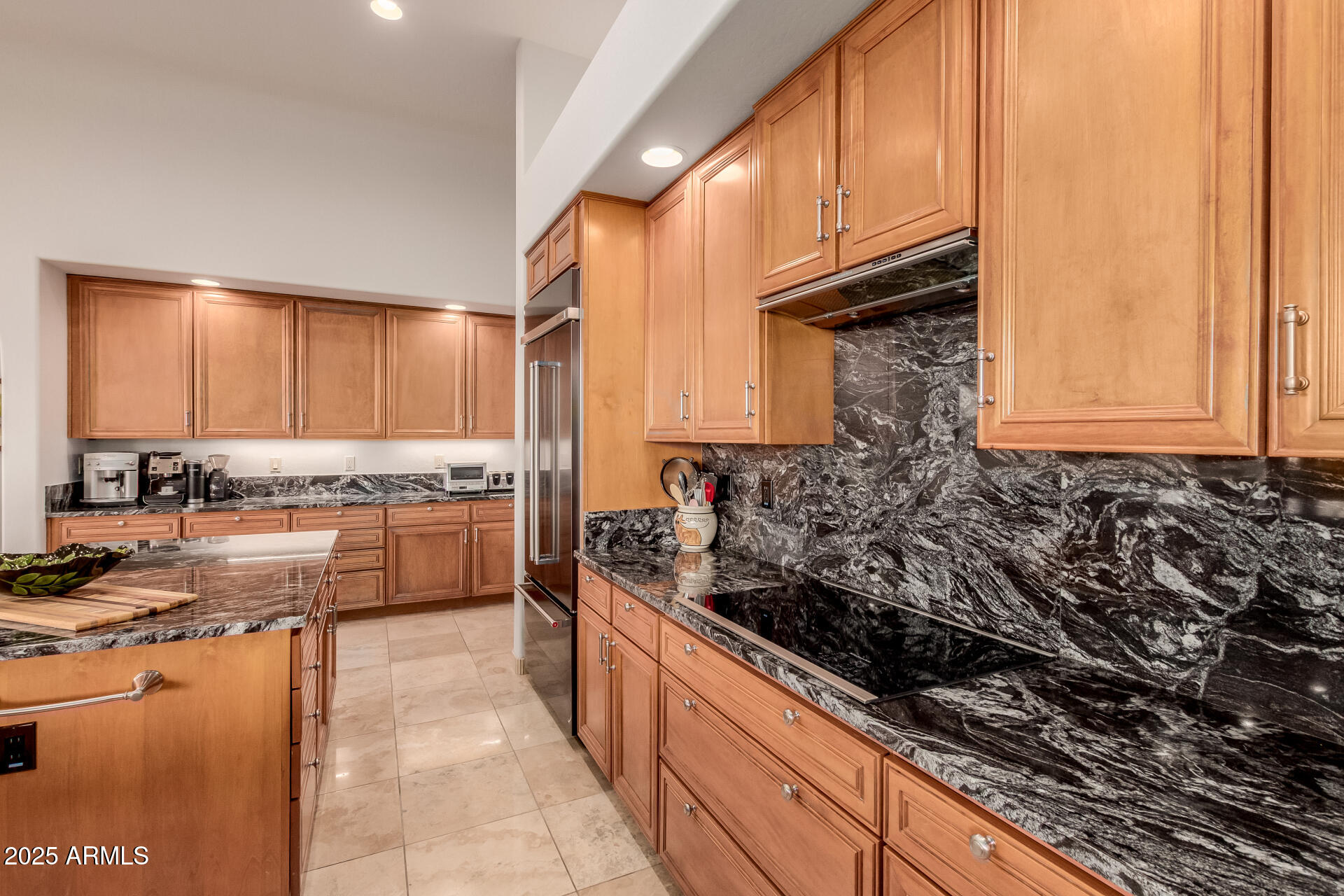 27609 Desierto Drive Rio Verde, AZ 85263 - Photo 24 of 86 a kitchen with stainless steel appliances granite countertop a stove a sink and a microwave