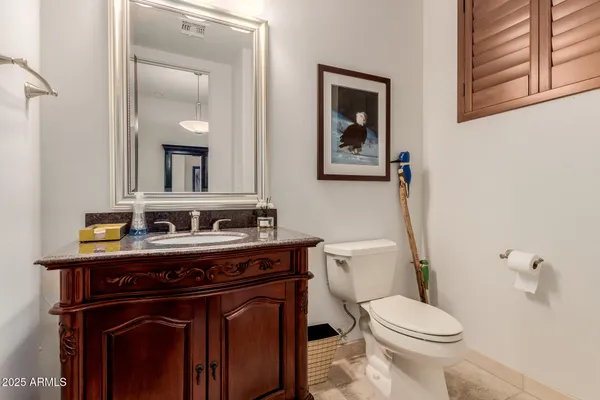 a living room with furniture gym equipment and a flat screen tv