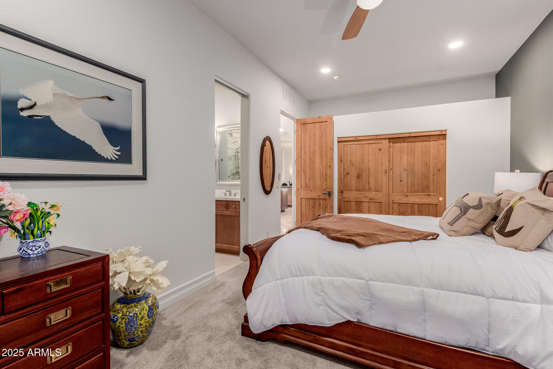 27609 Desierto Drive Rio Verde, AZ 85263 - Photo 34 of 86 a bedroom with a bed and a dresser