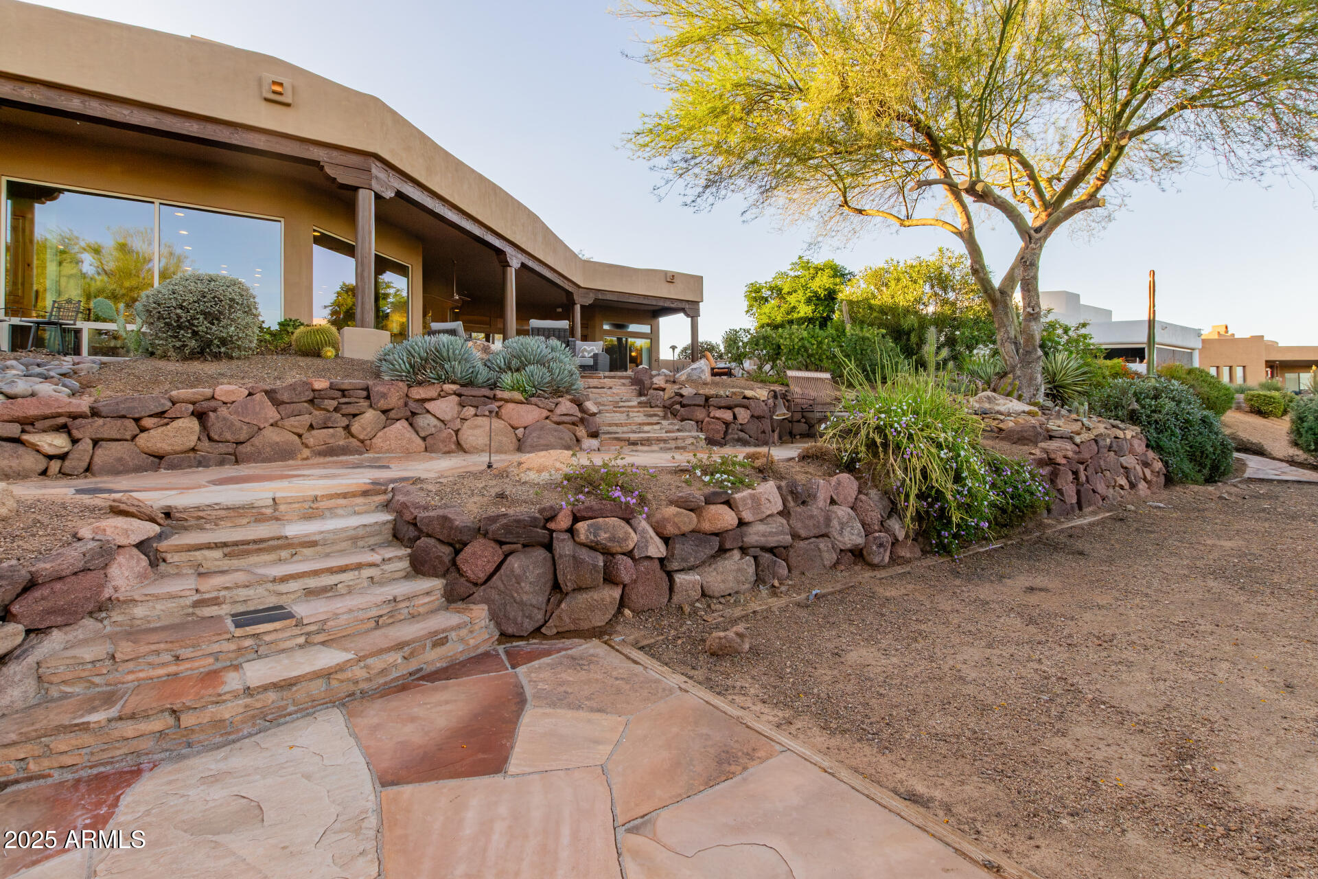 27609 Desierto Drive Rio Verde, AZ 85263 - Photo 55 of 86 a view of a chairs and table in the backyard