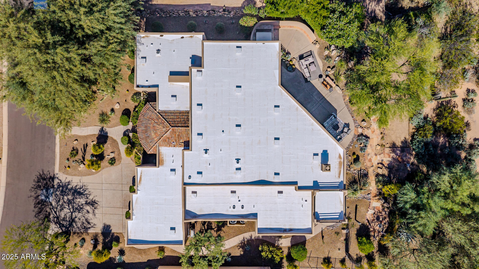 27609 Desierto Drive Rio Verde, AZ 85263 - Photo 65 of 86 an aerial view of a house with a yard and large tree