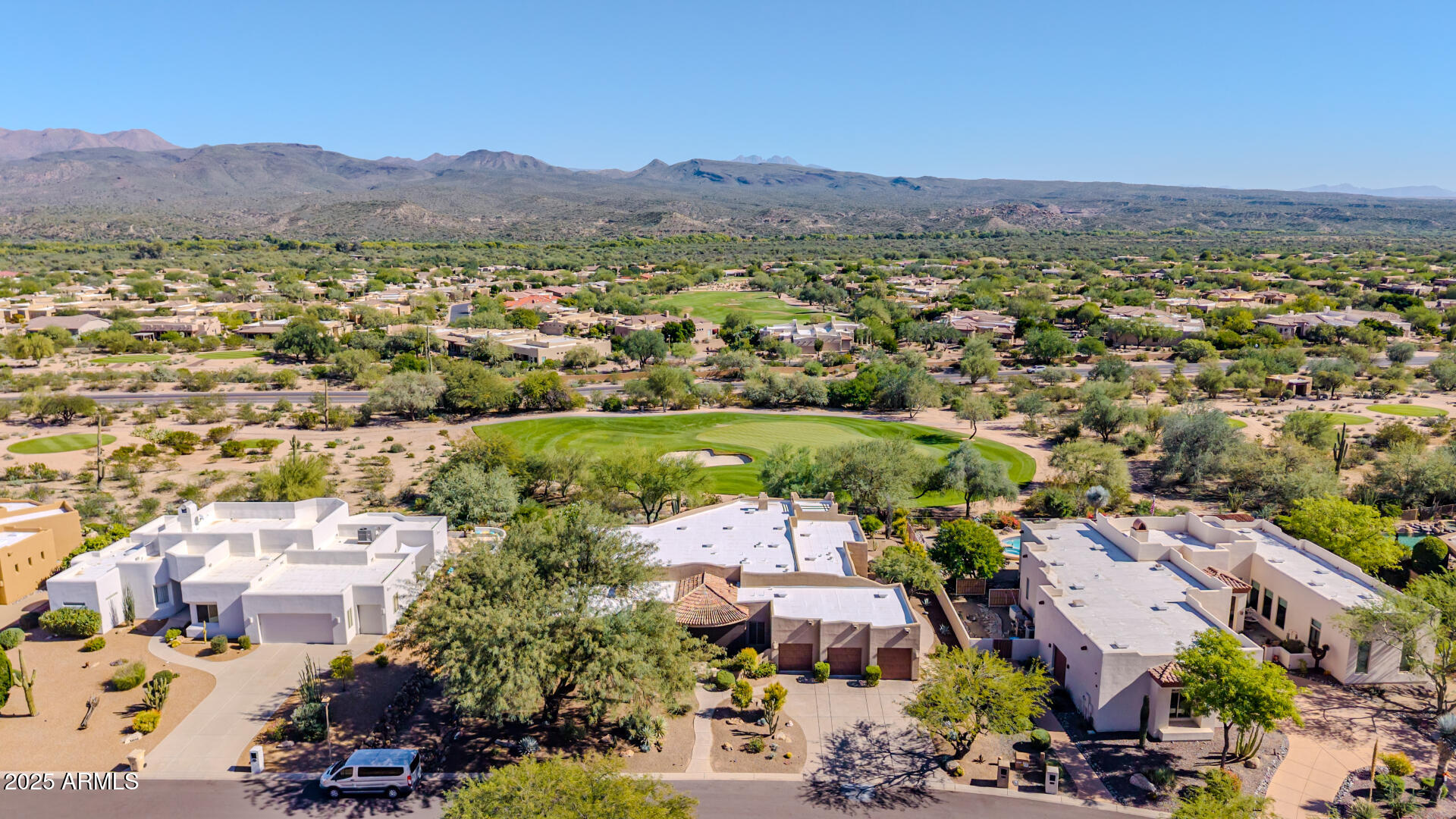 27609 Desierto Drive Rio Verde, AZ 85263 - Photo 72 of 86 an aerial view of residential houses and outdoor space
