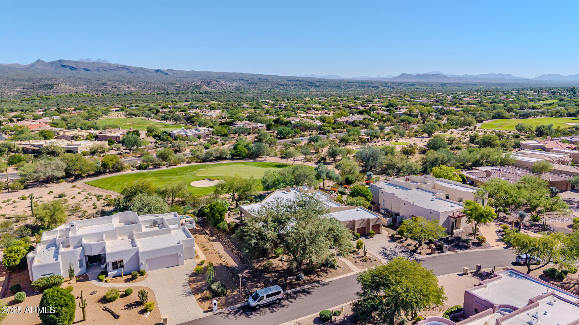 27609 Desierto Drive Rio Verde, AZ 85263 - Photo 74 of 86 an aerial view of a city with lots of residential buildings