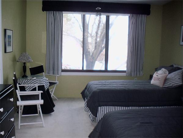 27 Cobblestone Lane, Unit 27 Worcester, MA 01606 - Photo 16 of 24 a bedroom with a bed and a window