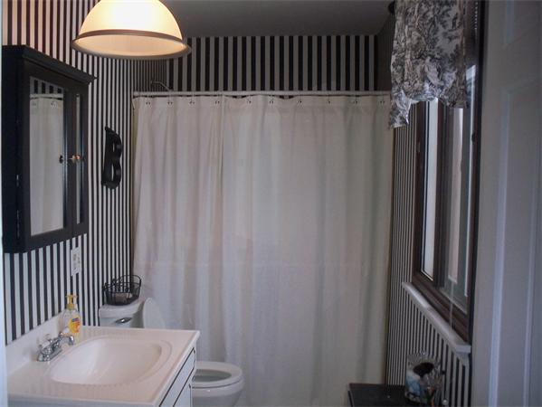 27 Cobblestone Lane, Unit 27 Worcester, MA 01606 - Photo 18 of 24 a bathroom with a sink and a mirror