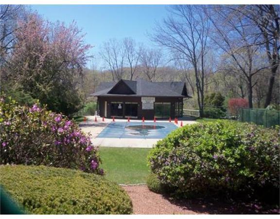 27 Cobblestone Lane, Unit 27 Worcester, MA 01606 - Photo 24 of 24 a swimming pool with outdoor seating and yard