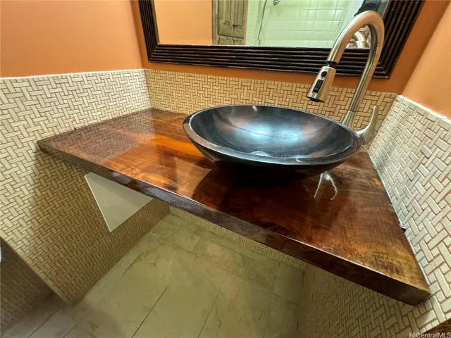 a bathroom with a sink and a toilet