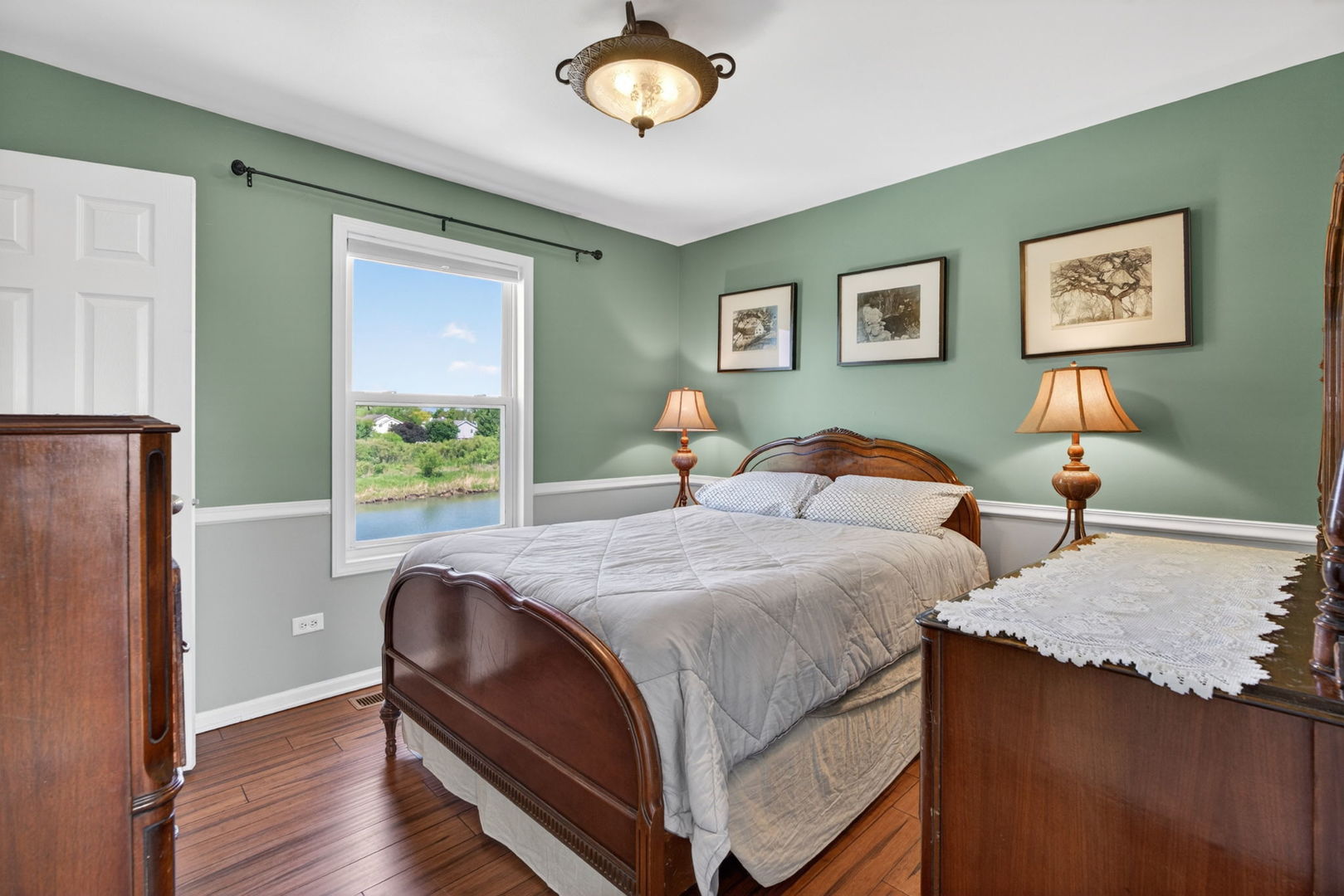 25204 Spring Street Manhattan, IL 60442 - Photo 20 of 34 a bedroom with a bed and a table