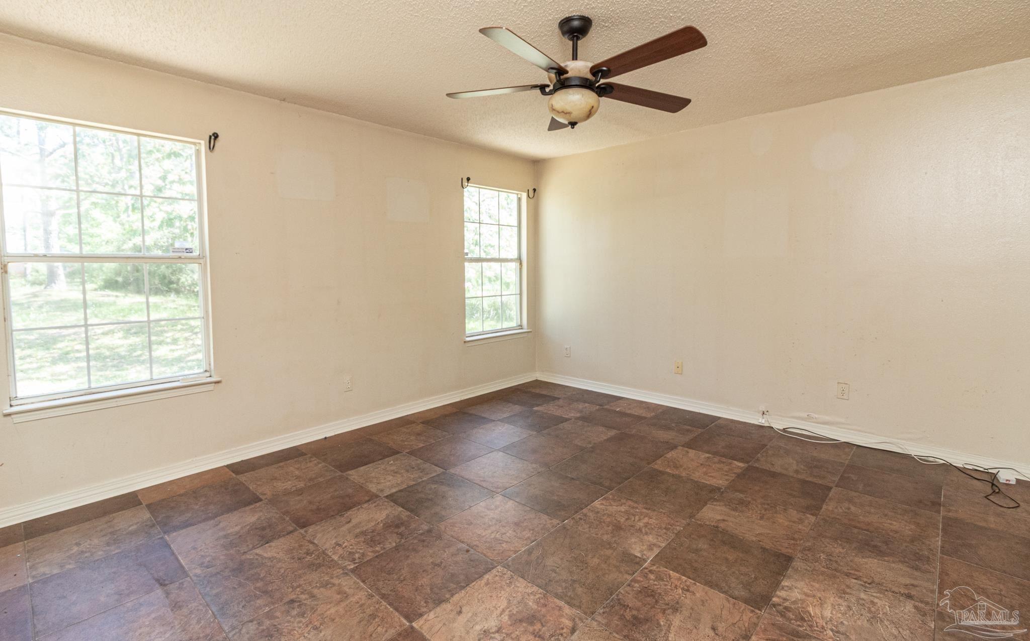 2394 Cove Road Navarre, FL 32566 - Photo 11 of 24 Master Bedroom