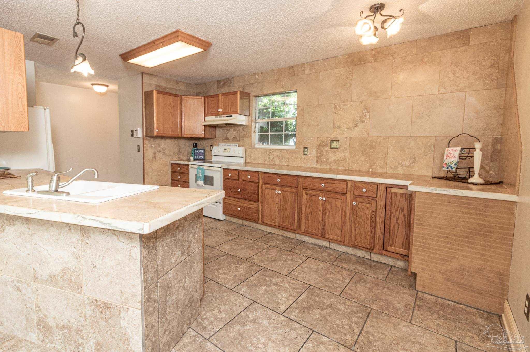 2394 Cove Road Navarre, FL 32566 - Photo 5 of 24 Kitchen