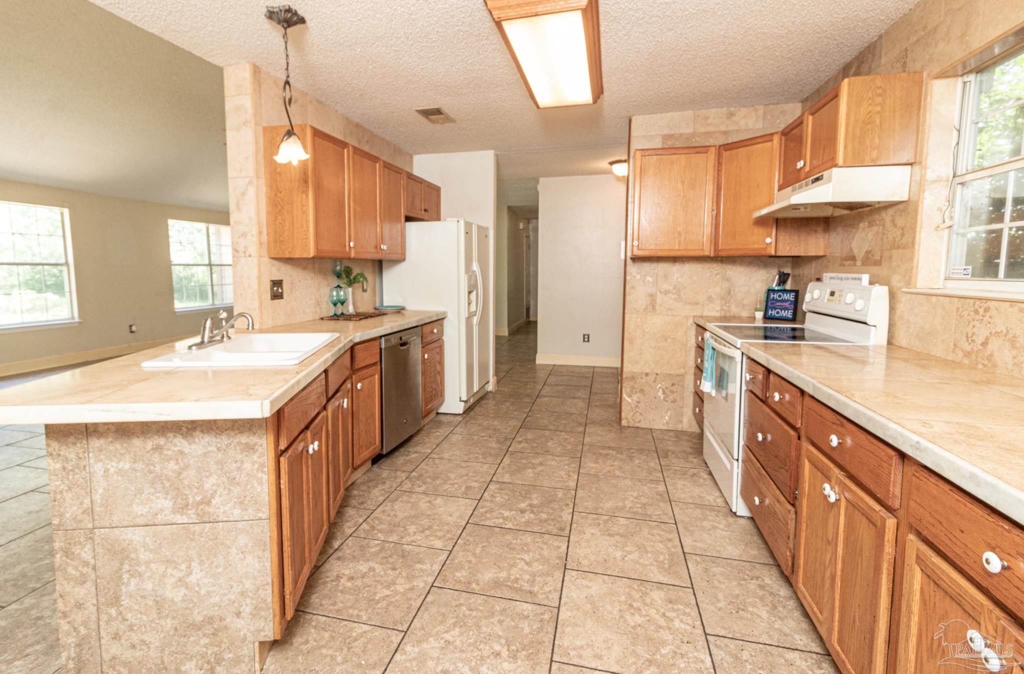 2394 Cove Road Navarre, FL 32566 - Photo 6 of 24 Kitchen
