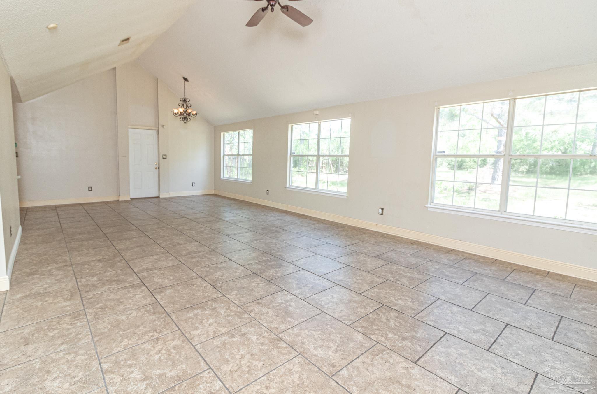 2394 Cove Road Navarre, FL 32566 - Photo 7 of 24 Overlooking Dining Area from Great Room