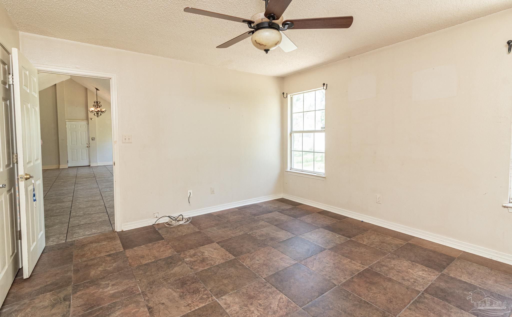 2394 Cove Road Navarre, FL 32566 - Photo 10 of 24 Master Bedroom