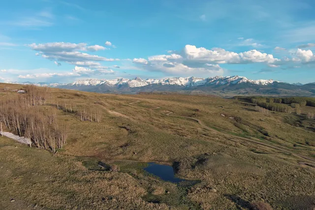a view of lake with mountain