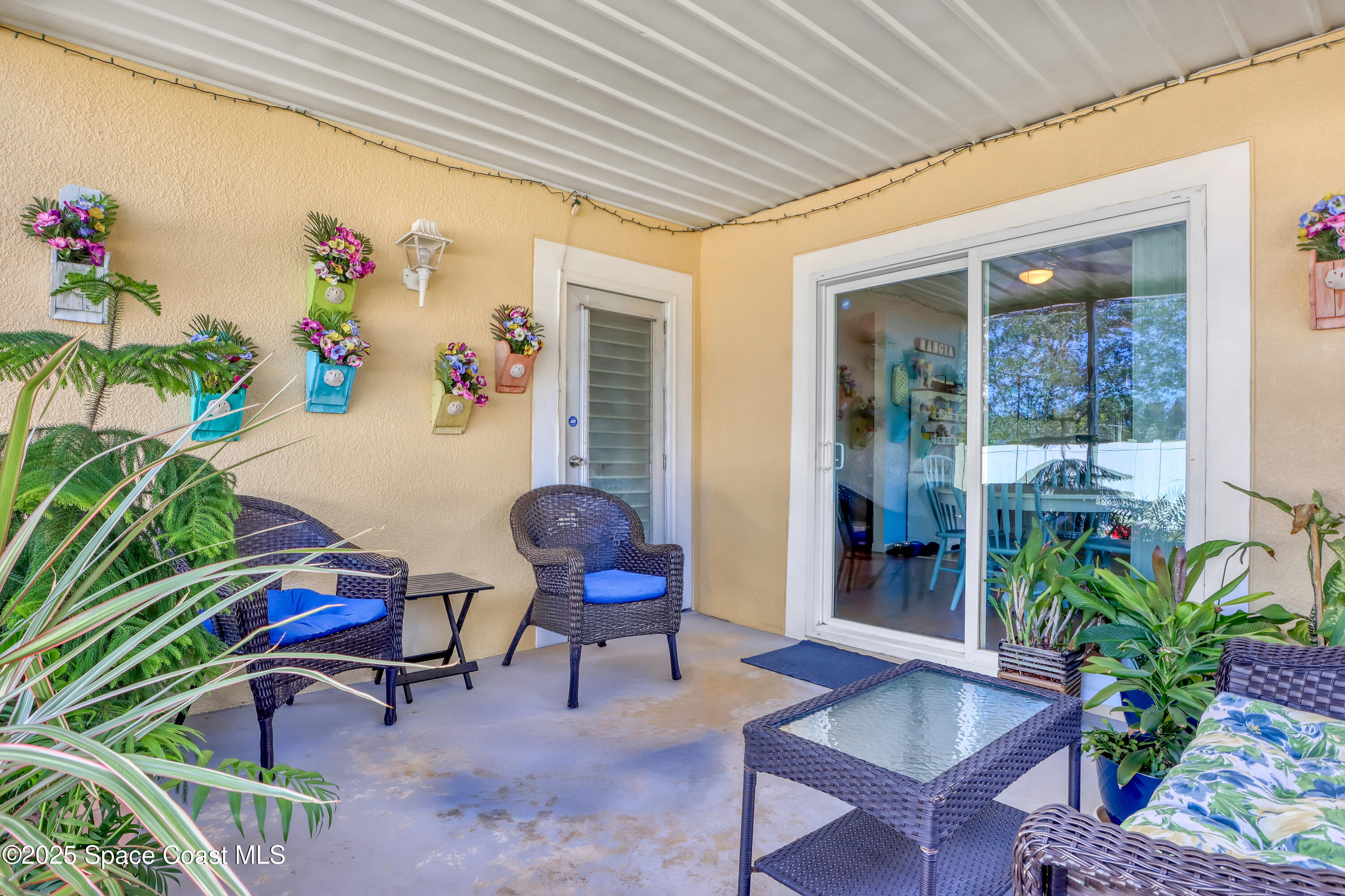 1513 Creel Road Northeast Palm Bay, FL 32905 - Photo 21 of 31 a outdoor living space with furniture